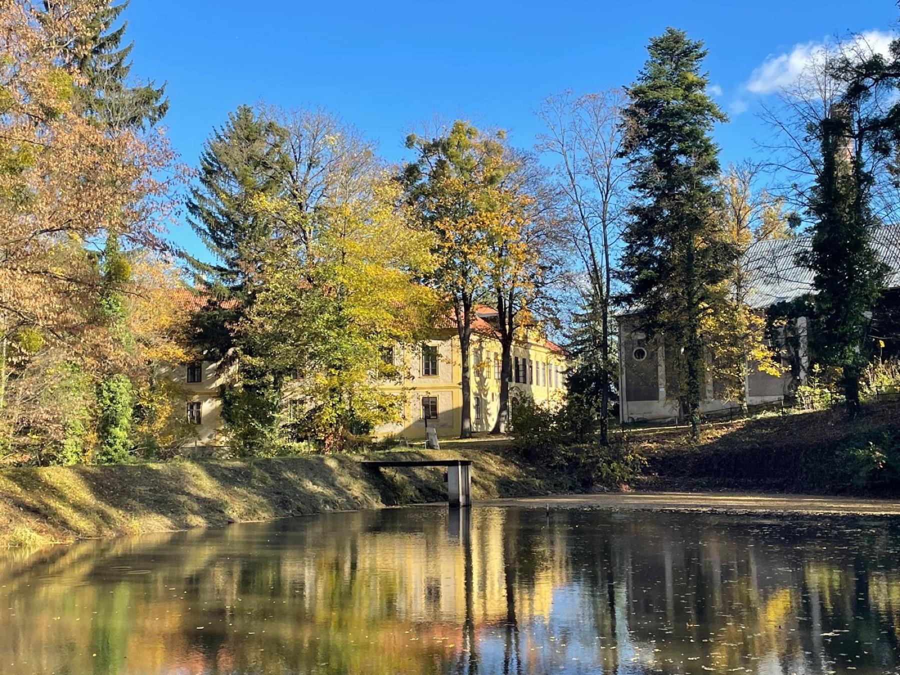 Hostačov across the lake in autumn